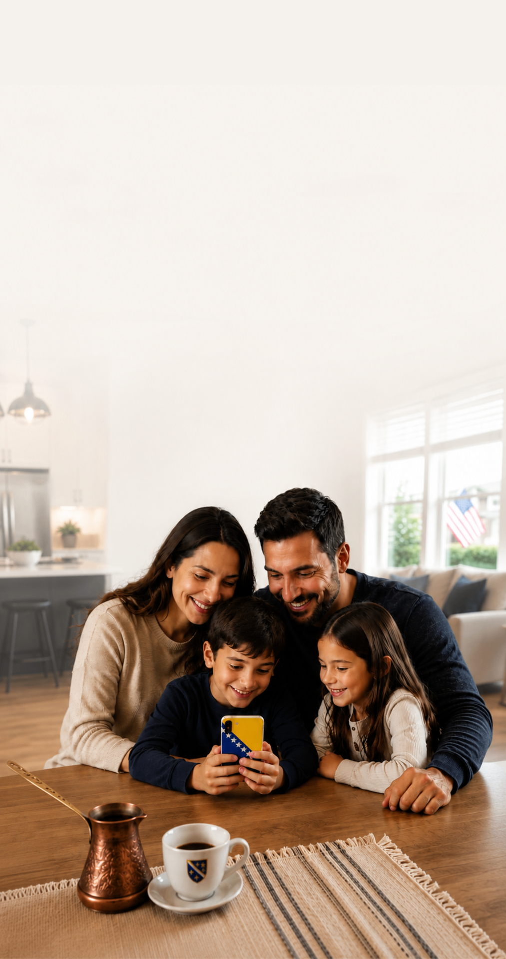 A smiling Bosnian family gathered around a phone at a kitchen table with a copper džezva and Bosnian coffee cup nearby